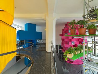 Through each of the four openings of the former brewing kettles a tower rises, which takes up a theme of the working methodology of MVRDV, 2019